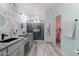 Spa-like bathroom with double sinks, a large walk-in shower, and marble tile at 6131 S Eagle Pass Rd, Gold Canyon, AZ 85118