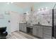 Elegant bathroom with double vanity, marble tile, and large mirrors at 6131 S Eagle Pass Rd, Gold Canyon, AZ 85118