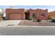 Single story home with a two-car garage at 6131 S Eagle Pass Rd, Gold Canyon, AZ 85118