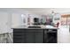 Kitchen island with granite countertop, sink, and dishwasher at 6131 S Eagle Pass Rd, Gold Canyon, AZ 85118