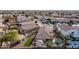 House with a large backyard, pool, and artificial turf, seen from above at 702 E Nancy Ave, San Tan Valley, AZ 85140