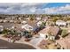 Two-story house with pool and landscaped yard in a neighborhood at 702 E Nancy Ave, San Tan Valley, AZ 85140