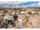 Aerial view of a house with pool and backyard, in a residential neighborhood at 702 E Nancy Ave, San Tan Valley, AZ 85140