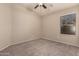 Bedroom with carpet, window blinds, and ceiling fan at 702 E Nancy Ave, San Tan Valley, AZ 85140