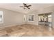 Living room with sliding door to backyard at 702 E Nancy Ave, San Tan Valley, AZ 85140