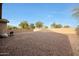 Backyard with gravel and grill at 10051 S 184Th Dr, Goodyear, AZ 85338