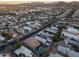 Aerial view of a house with a pool in a residential area at 13032 N 19Th St, Phoenix, AZ 85022