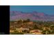 Stunning aerial view showcasing the property's mountain setting and surrounding area at 13032 N 19Th St, Phoenix, AZ 85022