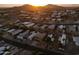 Aerial view showing a house in a neighborhood with mountain views at 13032 N 19Th St, Phoenix, AZ 85022