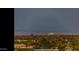 Long-range view of city skyline and distant mountains at 13032 N 19Th St, Phoenix, AZ 85022