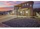 Two-story house with a large driveway and basketball hoop at 13032 N 19Th St, Phoenix, AZ 85022