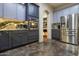 Modern kitchen with stainless steel appliances and granite countertops at 13032 N 19Th St, Phoenix, AZ 85022