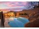 Relaxing backyard pool and pergola at sunset at 13032 N 19Th St, Phoenix, AZ 85022