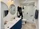 Modern bathroom boasts a double vanity, large shower, and updated fixtures at 13802 N 64Th Pl, Scottsdale, AZ 85254