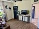 Spacious living room with hardwood floors and a modern console table at 13802 N 64Th Pl, Scottsdale, AZ 85254