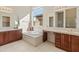 Large bathroom with double vanity and soaking tub at 1646 W Laurel Greens Dr, Phoenix, AZ 85086