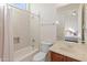 Clean bathroom with shower/tub combo and vanity at 1646 W Laurel Greens Dr, Phoenix, AZ 85086