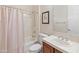 Clean bathroom featuring a shower/tub combo and vanity at 1646 W Laurel Greens Dr, Phoenix, AZ 85086