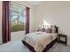 Comfortable bedroom with large window and view at 1646 W Laurel Greens Dr, Phoenix, AZ 85086