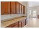 Additional kitchen counter space with granite top at 1646 W Laurel Greens Dr, Phoenix, AZ 85086