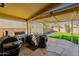 Outdoor kitchen and patio area with built-in grill and pergola at 1722 E San Xavier Dr, Casa Grande, AZ 85122