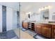 Elegant bathroom with double vanities and a walk-in shower at 1722 E San Xavier Dr, Casa Grande, AZ 85122