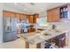 Modern kitchen with granite countertops and stainless steel appliances at 1722 E San Xavier Dr, Casa Grande, AZ 85122