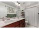 Bathroom with double vanity and shower/tub combo at 24758 W Huntington Dr, Buckeye, AZ 85326