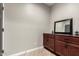 Small bathroom with vanity and mirror at 24758 W Huntington Dr, Buckeye, AZ 85326