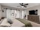 Main bedroom with barn doors to ensuite bath at 24758 W Huntington Dr, Buckeye, AZ 85326