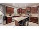 Modern kitchen with granite countertops and stainless steel appliances at 24758 W Huntington Dr, Buckeye, AZ 85326