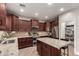 Modern kitchen with granite island and stainless steel appliances at 24758 W Huntington Dr, Buckeye, AZ 85326