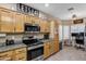 Modern kitchen featuring stainless steel appliances and ample cabinetry at 2524 N Sunaire --, Mesa, AZ 85215