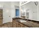 Primary bathroom with double sinks, marble countertop, and large mirror at 2549 E Cherrywood Pl, Chandler, AZ 85249