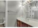 Bathroom with wood vanity and a toilet at 2549 E Cherrywood Pl, Chandler, AZ 85249