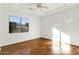 Bright bedroom with hardwood floors and window at 2549 E Cherrywood Pl, Chandler, AZ 85249