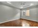 Bright bedroom with hardwood floors and ceiling fan at 2549 E Cherrywood Pl, Chandler, AZ 85249