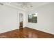 Bedroom with hardwood floors and ensuite bathroom access at 2549 E Cherrywood Pl, Chandler, AZ 85249