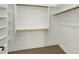 Bright walk-in closet with custom shelving and hanging rods at 2549 E Cherrywood Pl, Chandler, AZ 85249