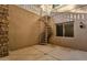 Outdoor spiral staircase and stone patio area at 2549 E Cherrywood Pl, Chandler, AZ 85249