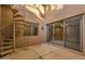 Private courtyard with spiral staircase and stone flooring at 2549 E Cherrywood Pl, Chandler, AZ 85249