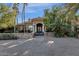 Elegant home with stone facade, gated entry, and a courtyard at 2549 E Cherrywood Pl, Chandler, AZ 85249