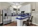 Small kitchen with stainless steel appliances and blue tile counters at 2549 E Cherrywood Pl, Chandler, AZ 85249