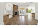 Open living area with stone fireplace and built-in shelving at 2549 E Cherrywood Pl, Chandler, AZ 85249