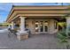 Covered patio with seating area, adjacent to pool and outdoor kitchen at 2549 E Cherrywood Pl, Chandler, AZ 85249