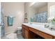 Bathroom with double vanity and shower/tub combo at 27227 N 171St Dr, Surprise, AZ 85387