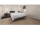 Main bedroom with a king-size bed and nightstands at 27227 N 171St Dr, Surprise, AZ 85387