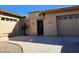 Tan stucco home featuring a decorative cactus and stone entryway at 4361 S Tigre Del Mar Dr, Gold Canyon, AZ 85118