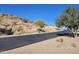 Neighborhood street with desert landscaping and mountain views at 4361 S Tigre Del Mar Dr, Gold Canyon, AZ 85118