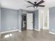 Second bedroom with gray walls and ceiling fan at 609 W Grandview Rd, Phoenix, AZ 85023